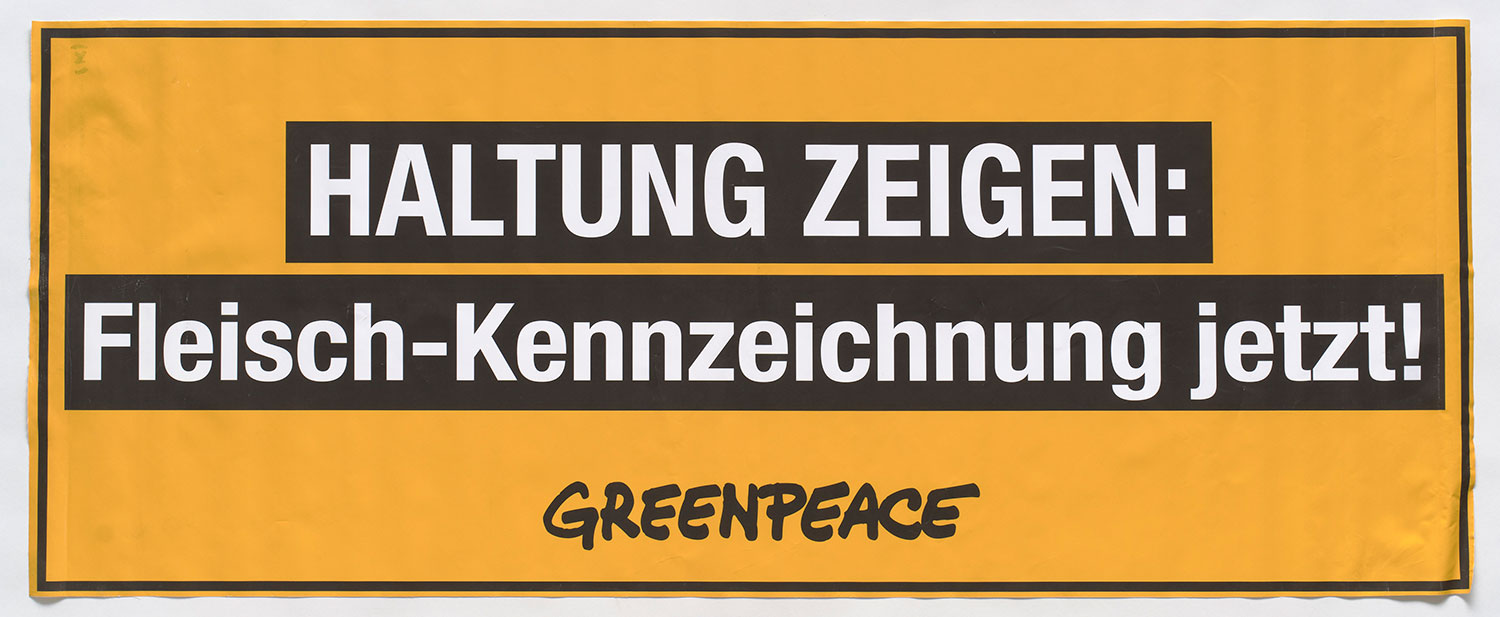 Gelbes Transparent mit schwarzer Schrift